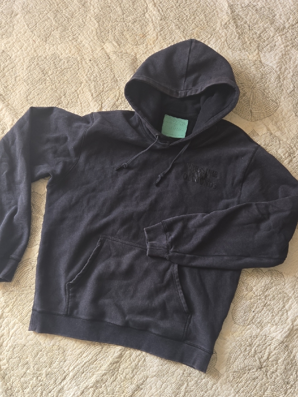 Men's Black Pullover Hoodie with Subtle Chest Detail